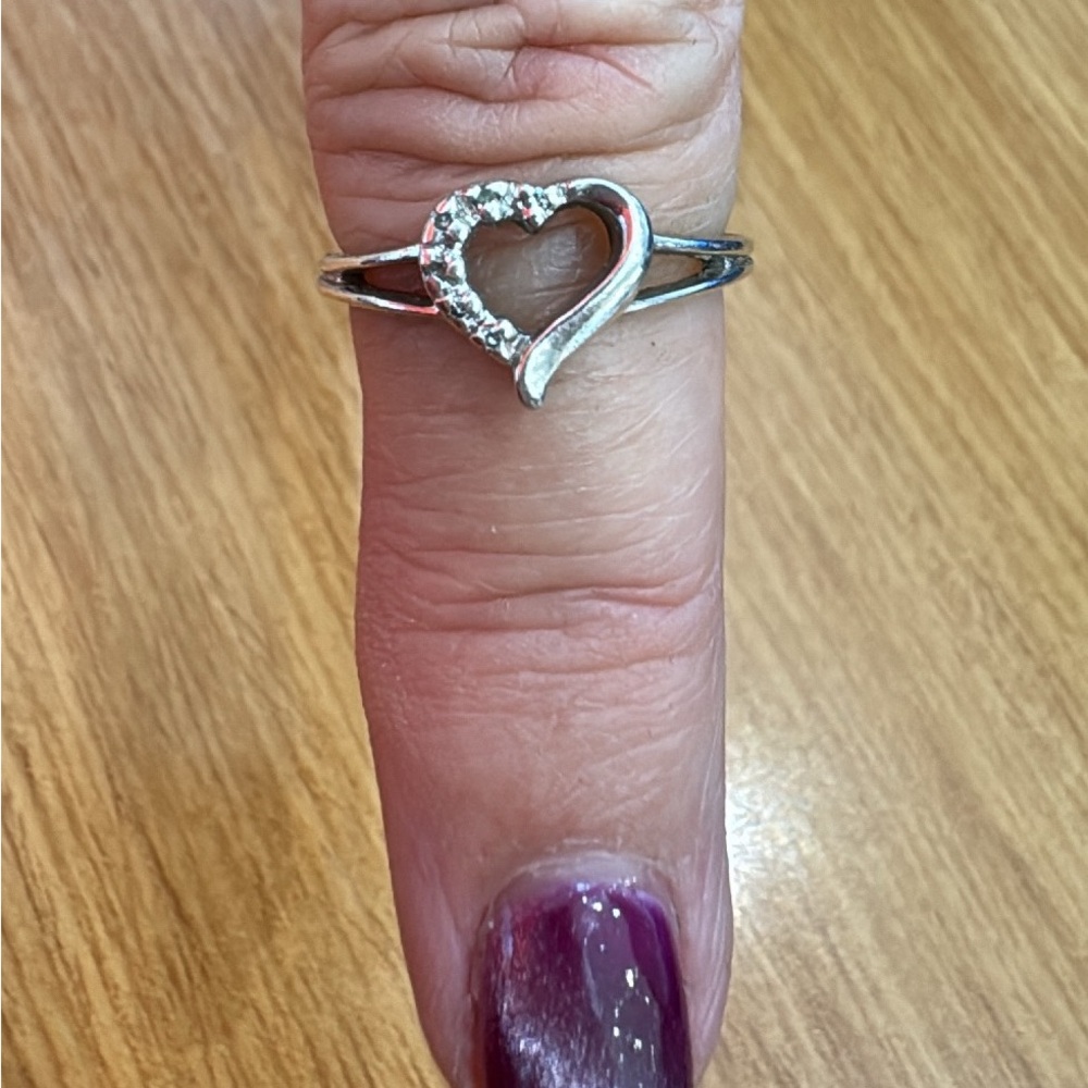 Sterling silver heart love ring size 7  $50